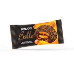 A cake covered in cocoa and filled with caramel sauce